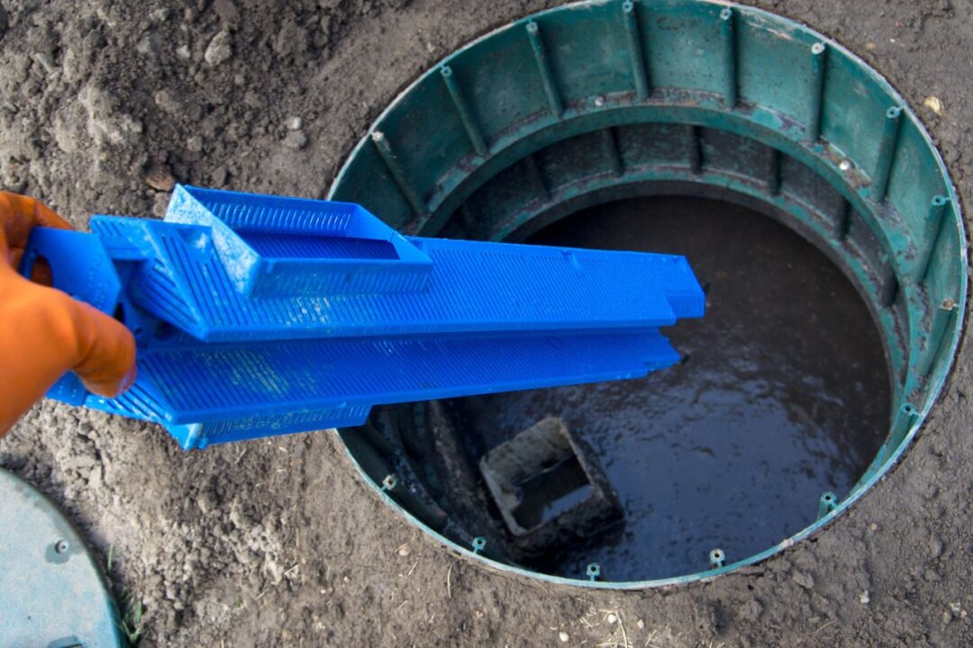 man removing effluent screen